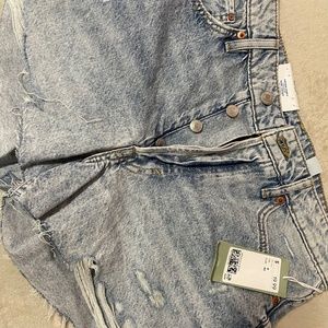 Destroyed denim shorts